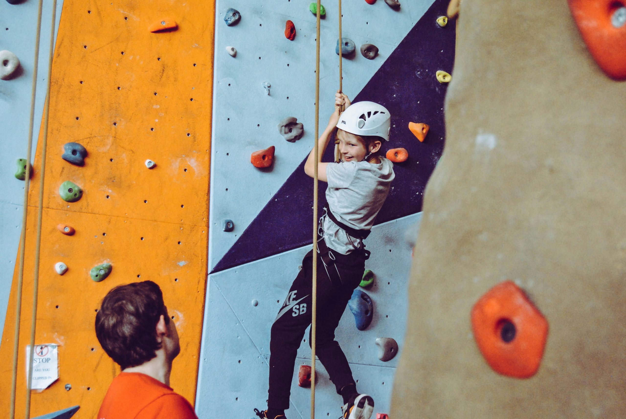 climber and coach discussing the plan