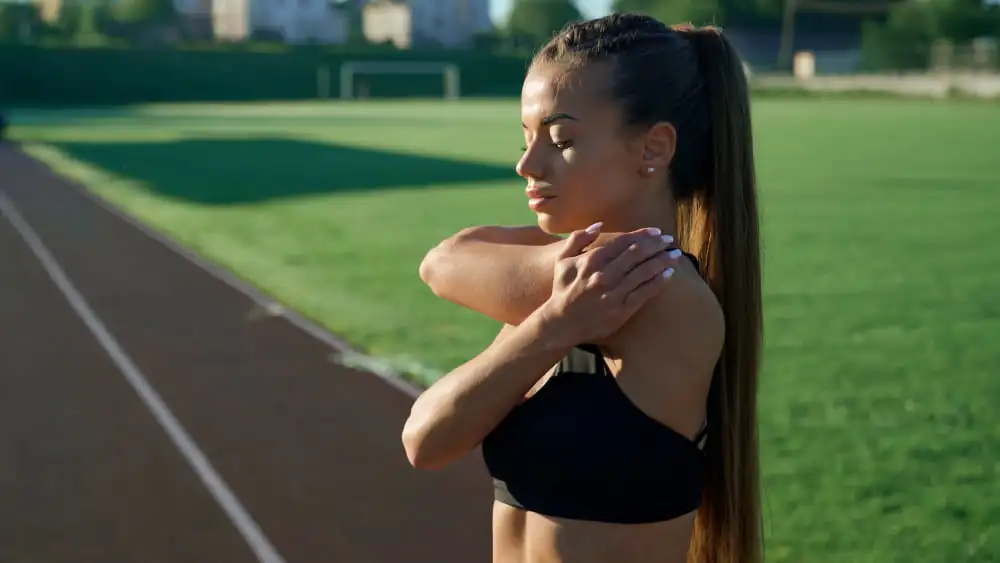 athlete warming up and mentally preparing before run